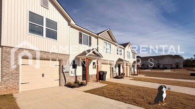 Building Photo - Spacious Two-Story Townhome with Open Layout!