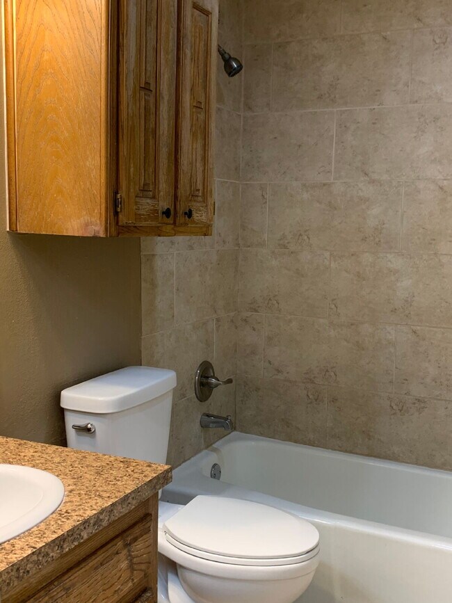 Building Photo - Spacious South Lubbock Townhome with Bonus Space & 2-Car Garage