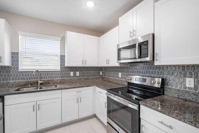 Building Photo - Newer Construction Rental with Open Layout...