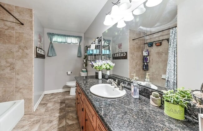 Building Photo - Beautiful Solar-Powered 4 Bedroom Home