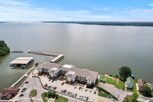 Building Photo - Riverfront Living with Spacious Layout and...