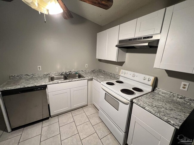 Building Photo - 6809 Tiki Ln