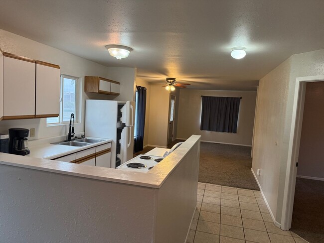 Building Photo - Centrally Located Three-Bedroom, One-Bathr...