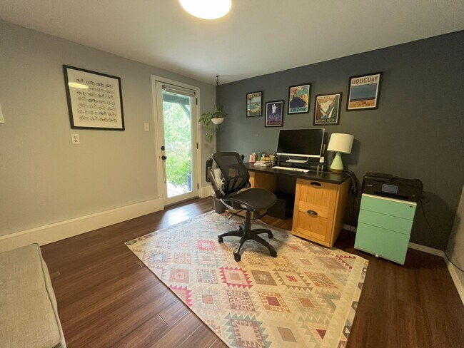 Building Photo - Spacious 4-Bedroom Home with Lush Landscap...