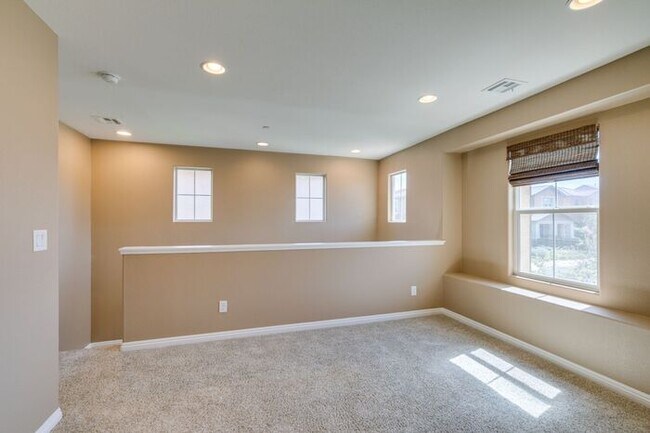 Building Photo - Better Than New with Stunning Designer Upgrades Throughout!