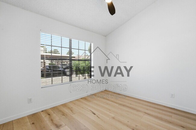 Building Photo - 5704 E Aire Libre Ave