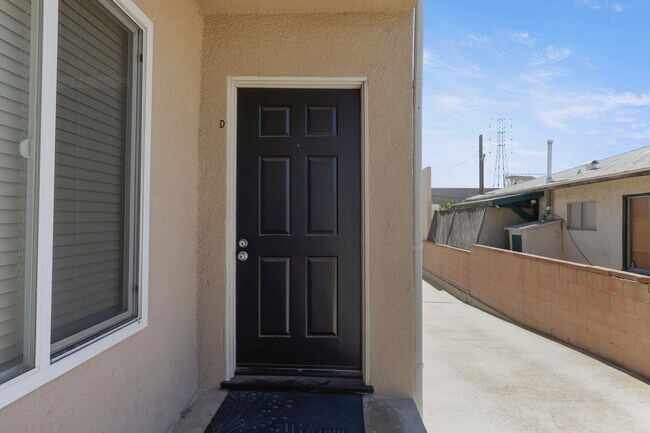 Front door to unit D - 2516 Voorhees Ave