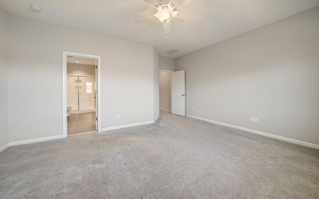 Building Photo - Contemporary, spacious 3-bedroom, 2.5-bath...