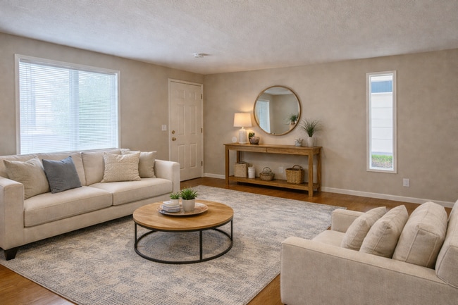 Building Photo - Private, Sunny Townhome | Carpet Free | Parking & Laundry Included