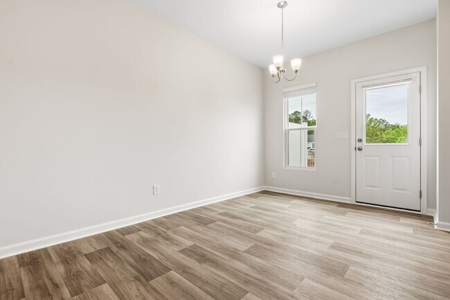Building Photo - Prime Location! Brand New 3 Bed Townhome