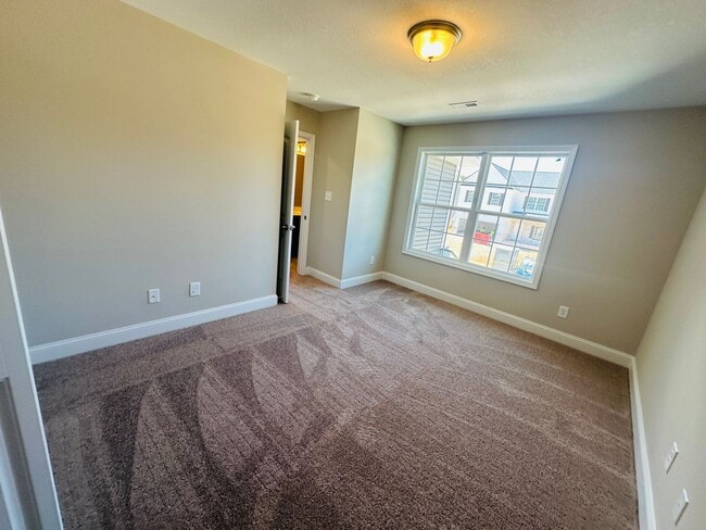 Building Photo - Beautiful Like-New 3 bed/2.5 bath w/ 2-car garage & fenced in backyard available June 24th!