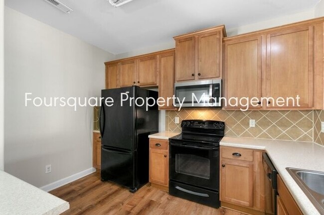 Building Photo - Cozy Townhome with Fireplace, Private Back Patio,  Near US-1, I-540 & Shopping