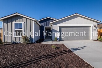 Building Photo - 4 Bedroom/2 Bath Home with Solar in the Desired Southwest - $2500 Per Month!