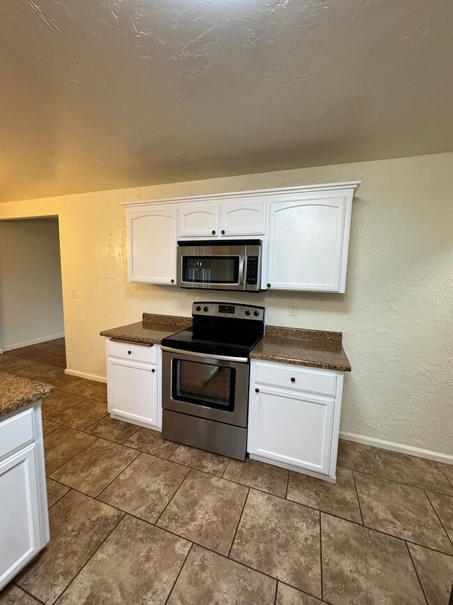 Building Photo - Winston 3 bedroom 2 bath with large storage shed and carport