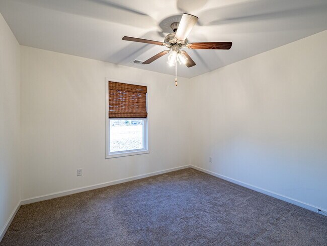 Building Photo - Available now! Has solar panels!