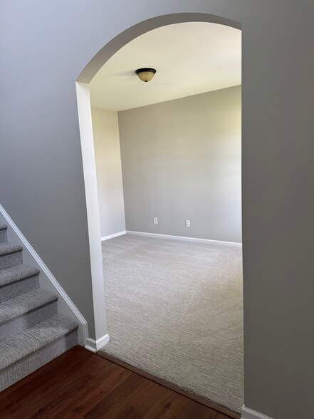 front room/stairs - 100 Pine Lakes Drive