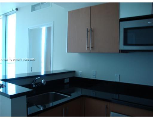 Building Photo - 300 S Biscayne Blvd