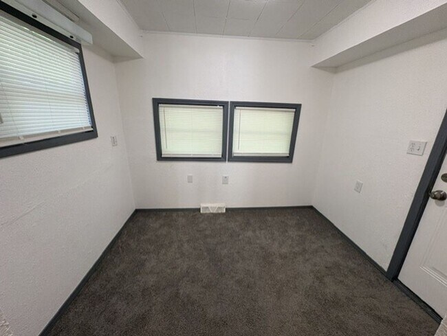 Building Photo - Move-In Ready 2-Bedroom Home with Modern Kitchen, Basement & Front Porch