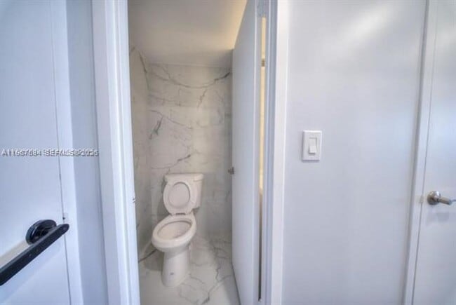 Building Photo - 2899 Collins Ave