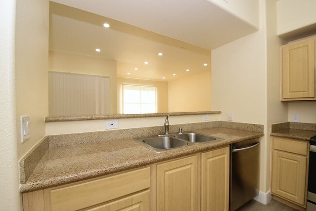 Building Photo - Charming Two-Bedroom Condo with Prime Location At Coronado Palms!