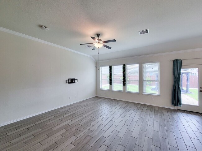 Building Photo - This thoughtfully designed home boasts 4 spacious bedrooms (2 down) and 3.5 baths, providing ampl...