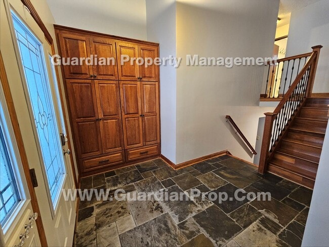 Building Photo - Updated Plymouth Single Family Home, 2 Car Garage, Large fenced Yard, Gas Fireplace