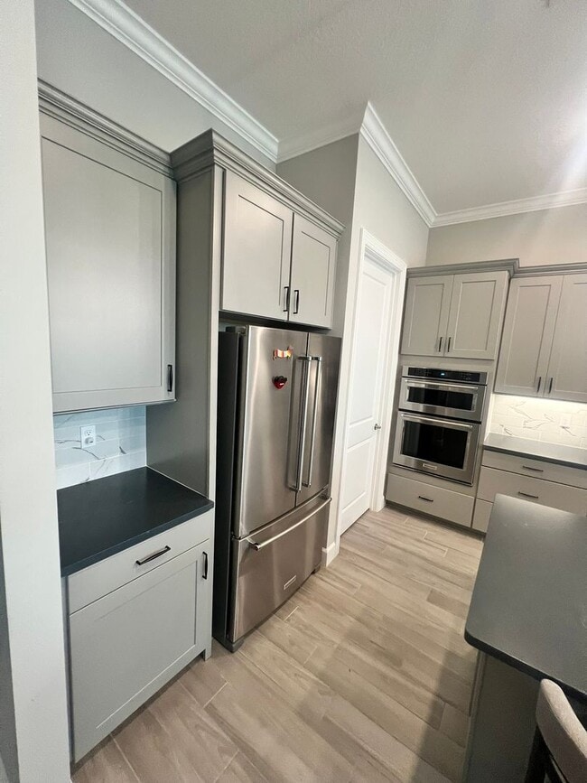 Building Photo - STUNNING LAKEFRONT 3 BEDROOM, 2.5 BATH HOM...