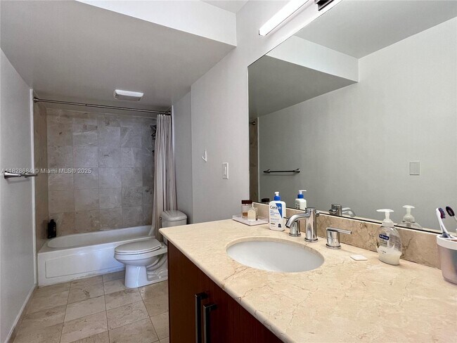 Building Photo - 10275 Collins Ave