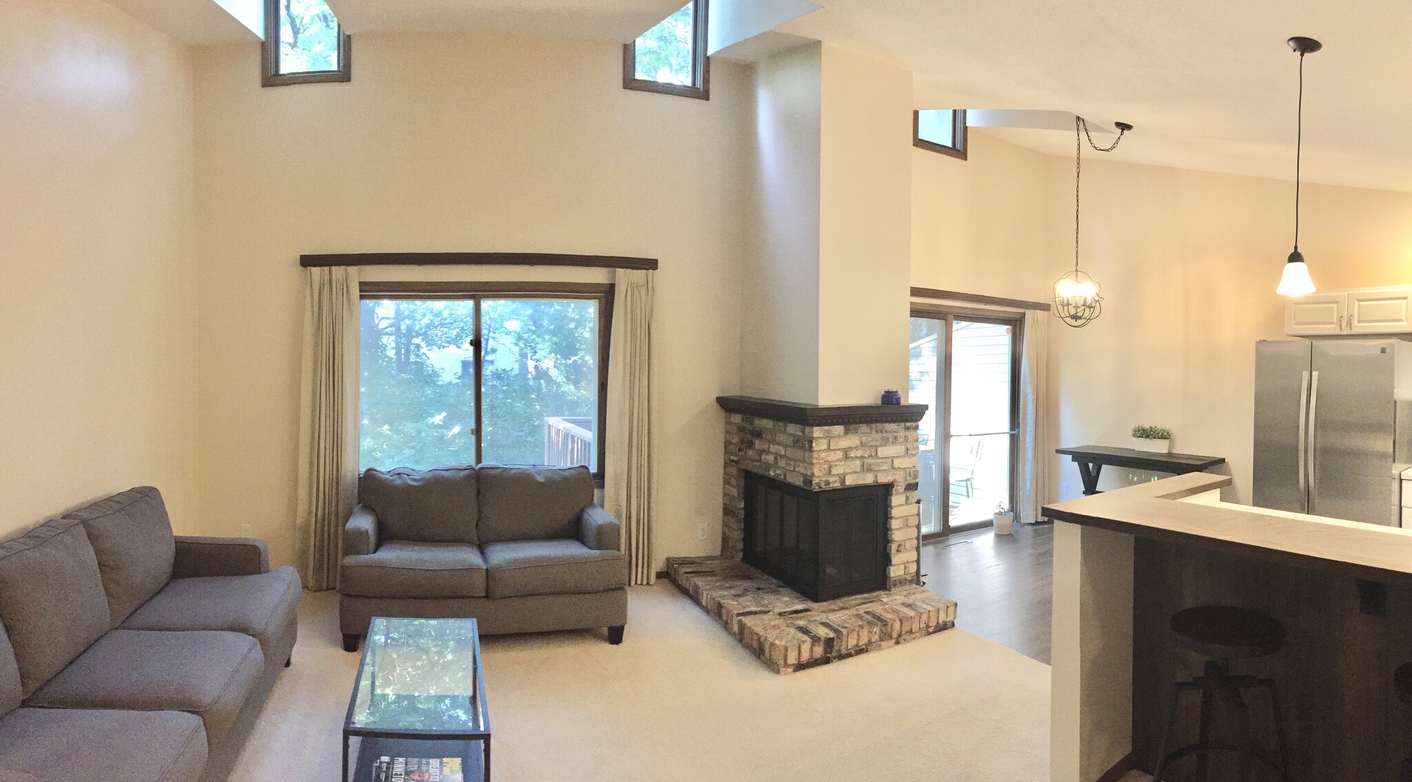 Open-concept living space, with vaulted ceilings. - 1511 Trapp Court