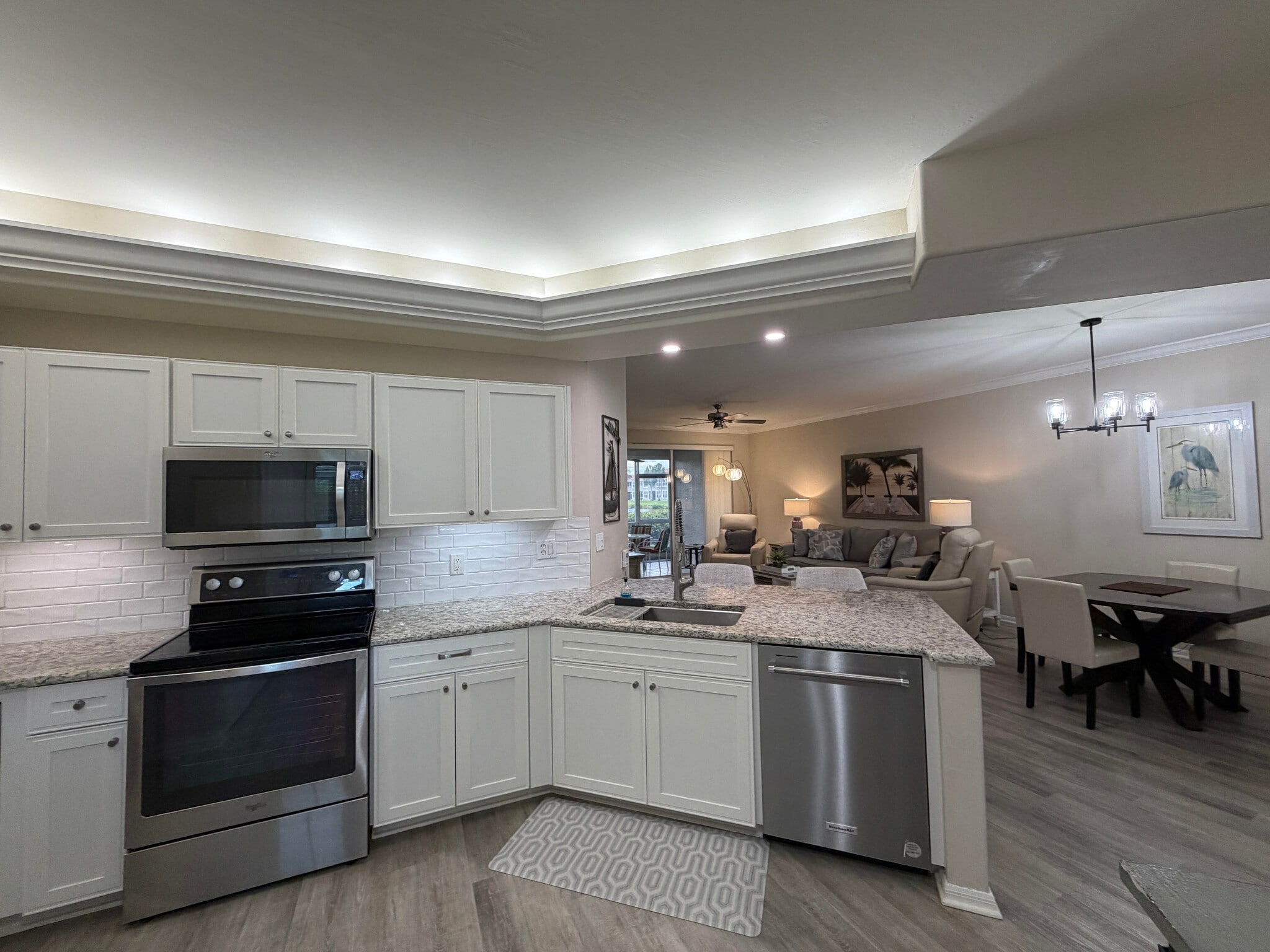 Island height granite counters and opened up to view living room, etc. - 9231 Spring Run Blvd