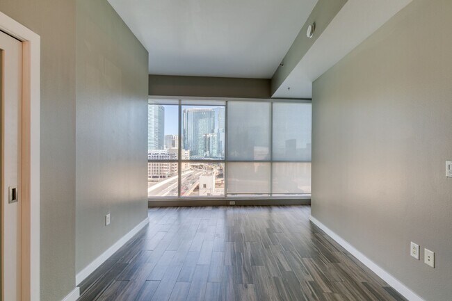Building Photo - Iconic Strip-View Luxury | Elegant 1BR + Den High-Rise Residence