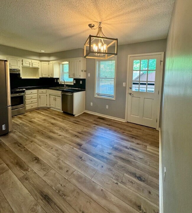 Building Photo - Exceptional Split-Level Home on Large Corn...