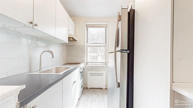 Building Photo - 105-25 64th Ave