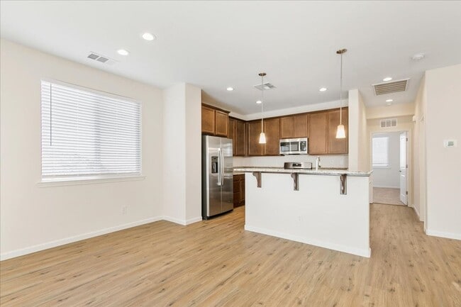 Building Photo - The Tahoe - Luxury 3 Bedroom, 2.5 Bath Townhome with Full 2 Car Garage