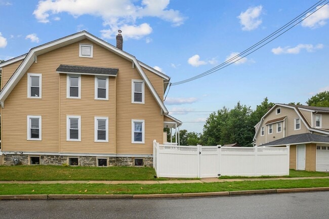 Building Photo - FIRST MONTH FREE* Large Twin Home! One (1) Car Garage, W/D Hookups in basement, Stainless Applian...
