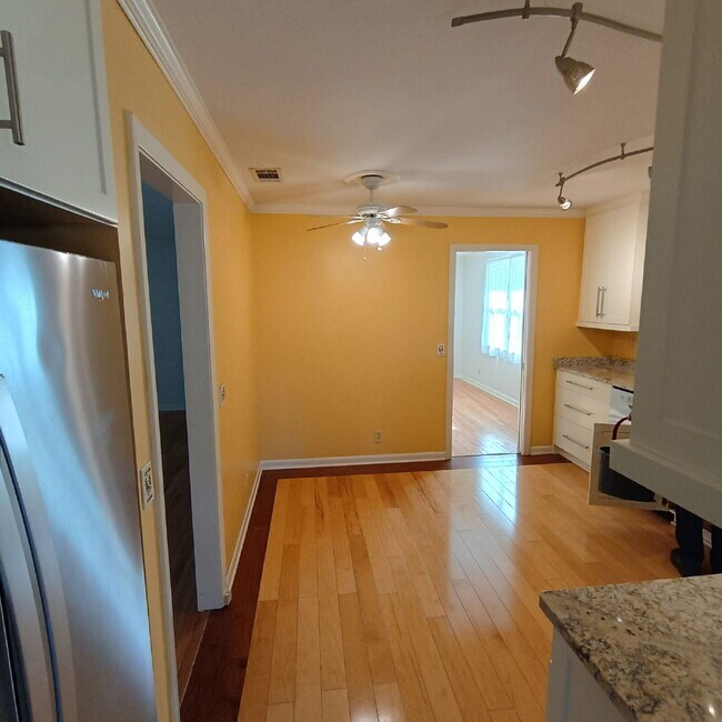 Building Photo - Modern Comforts with Granite & Hardwood Finishes!" 3 Bedroom 2 bath home.