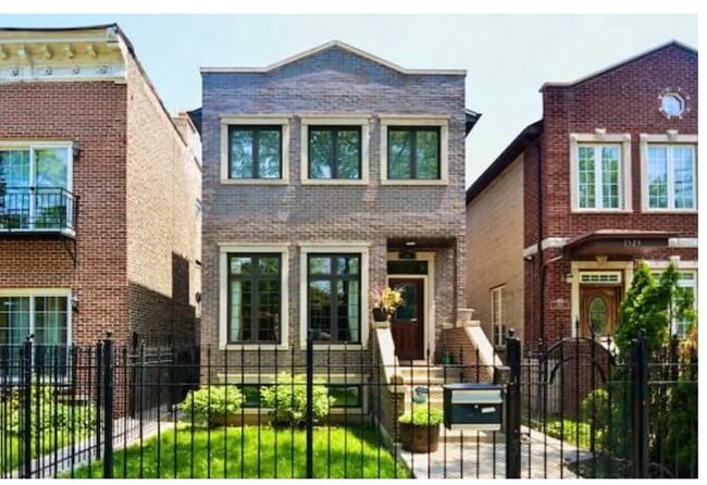 Gated House Facade - 1525 N Maplewood Ave