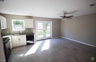 Building Photo - Cute townhome with 3 bd,2.5 bath, with gar...