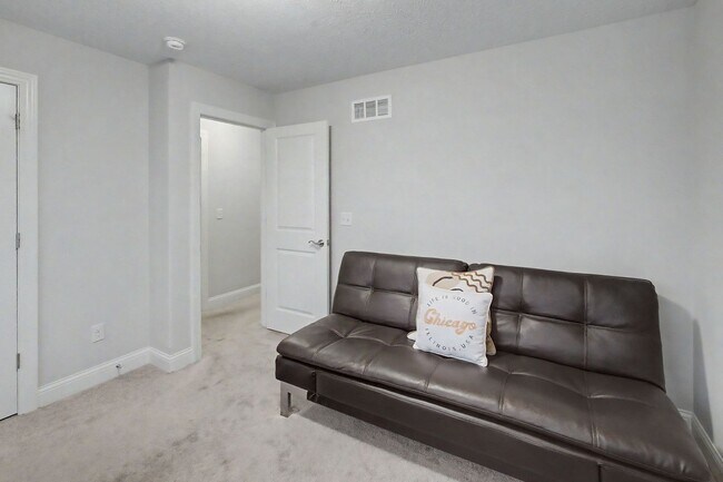 Building Photo - Spacious 4-Bedroom, 3.5-Bathroom Townhome & 2-Car Garage-West Champaign