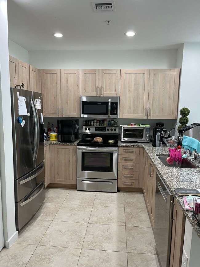 Granite Counters and Stainless Appliances - 6296 SE Portofino Cir