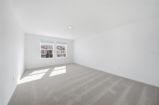 Building Photo - 8879 Coqui Song Ln