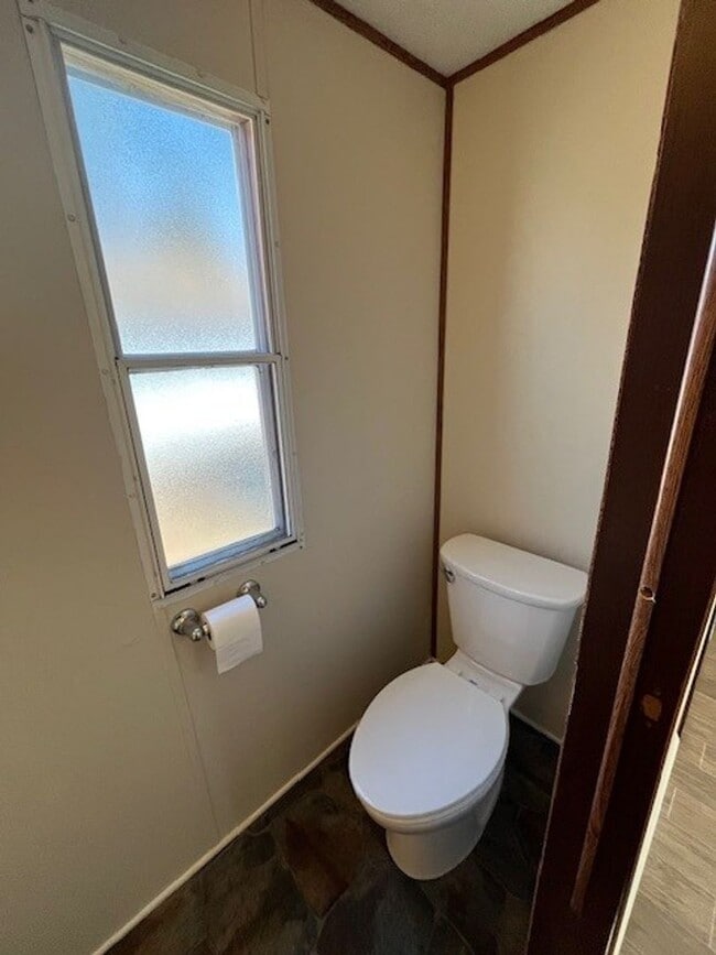 Building Photo - Welcome to this charming 2-bedroom, 1.5-bathroom home located in the desirable area of Leland, NC