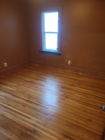 Rear bedroom, new fresh paint prior to move in - 469 Maplewood Ave