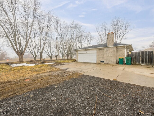 Building Photo - AVAILABLE NOW! Charming 3-Bed Home with Spacious Yard in Van Buren Township