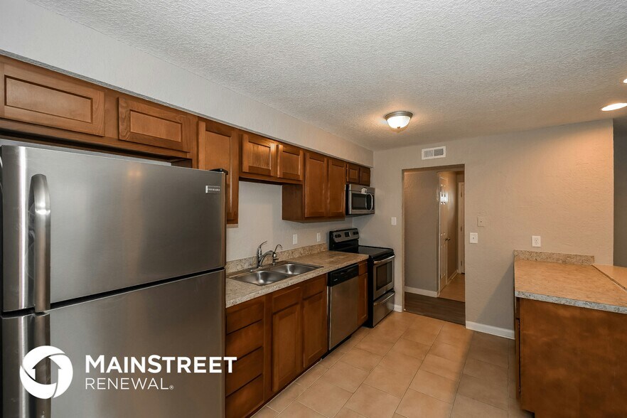 Building Photo - 7525 Pheasant Run Dr