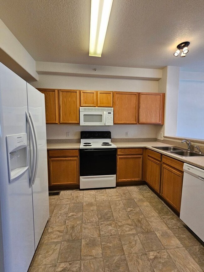 Building Photo - 9758 Laredo St.