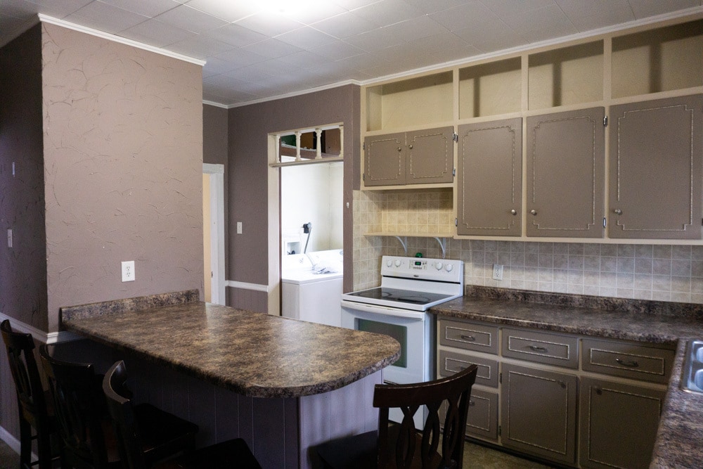 View of kitchen facing south, with view of laundry area and entrance to master bedroom - 622 End Ct