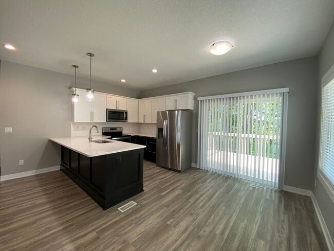 Building Photo - Beautiful and Unique Carriage House style home!