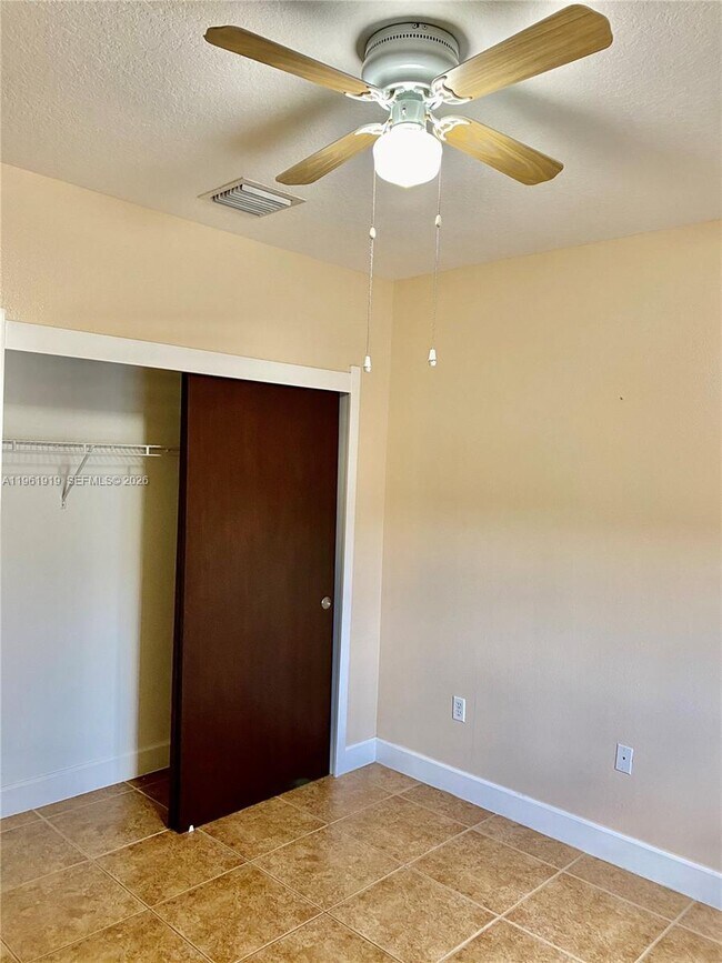 Building Photo - 11115 W Okeechobee Rd