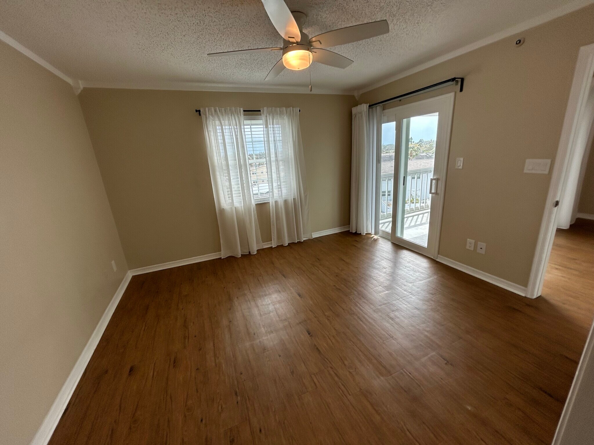 Mater Bedroom with patio doors to balcony - 6810 Stones Throw Cir N